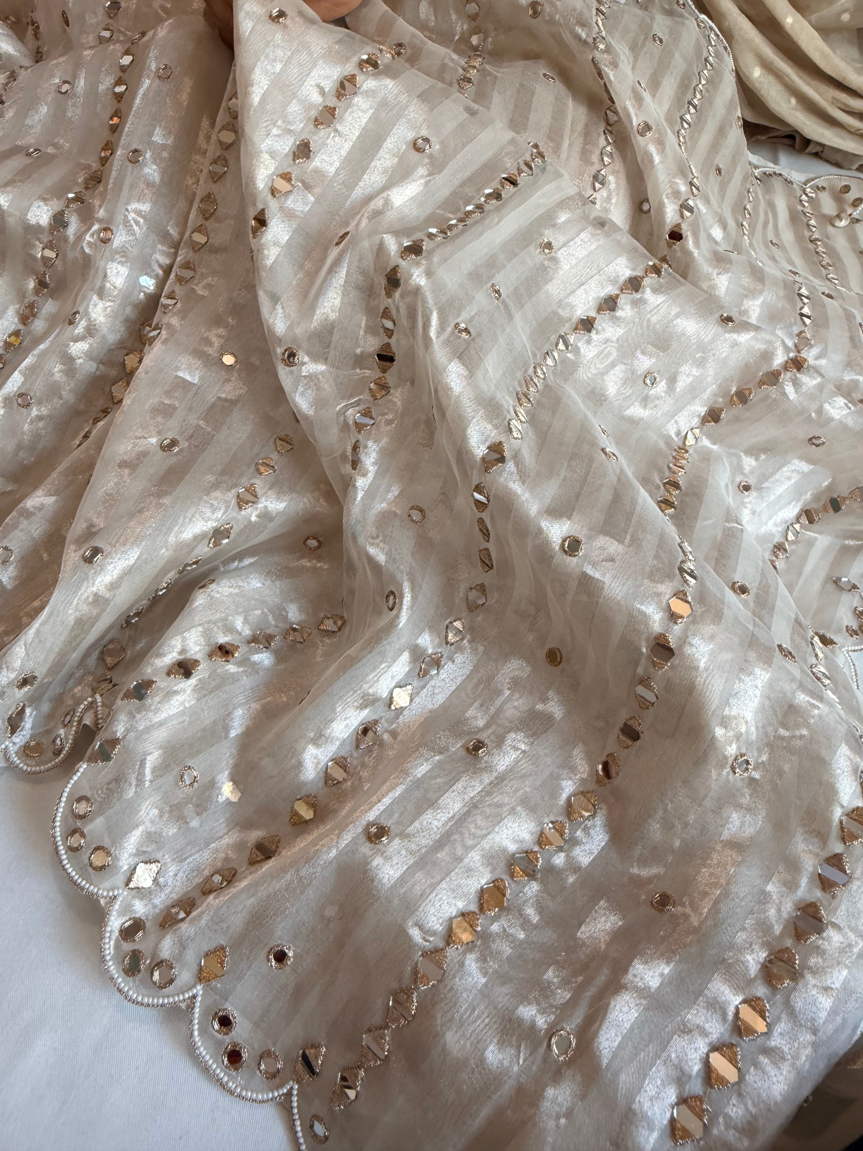 Diamond tissue silk zari stripes mirror work hand embroidered kadhwa saree