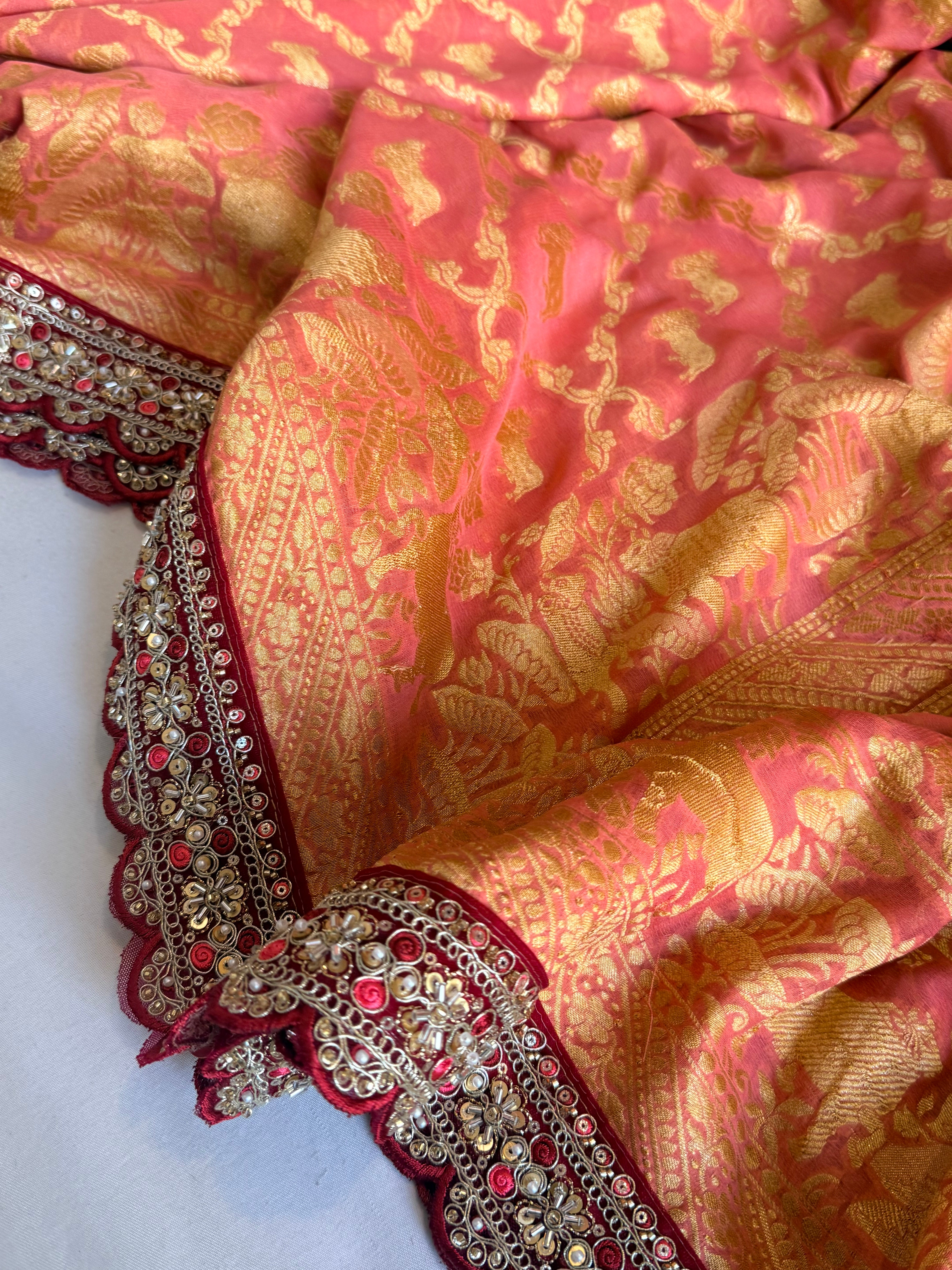 Peachy pink shikargah kadhwa border chiffon gorgette banarasi saree