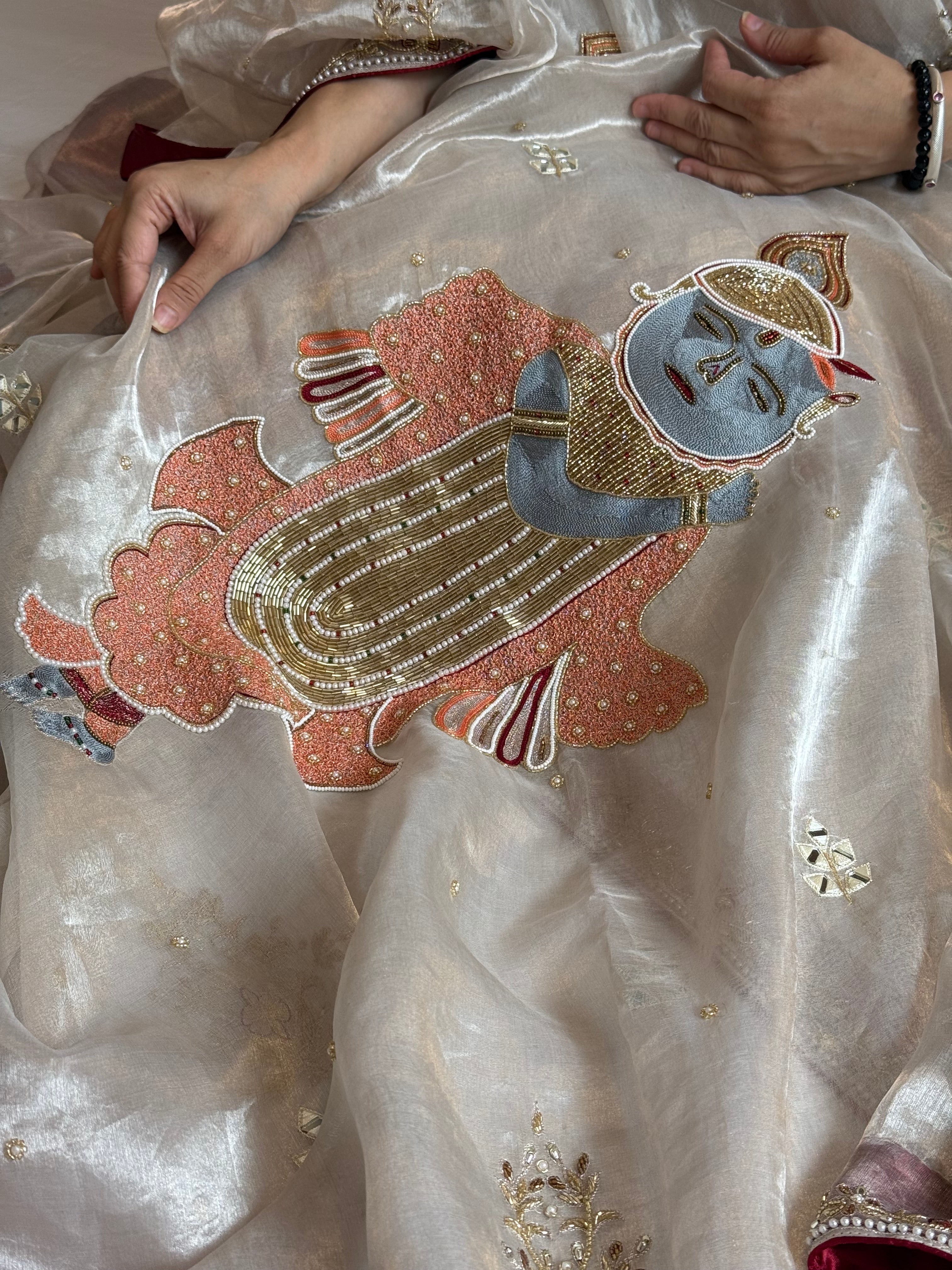 Radhika merchant inspired shreenathji motif diamond tissue silk hand embroidered saree