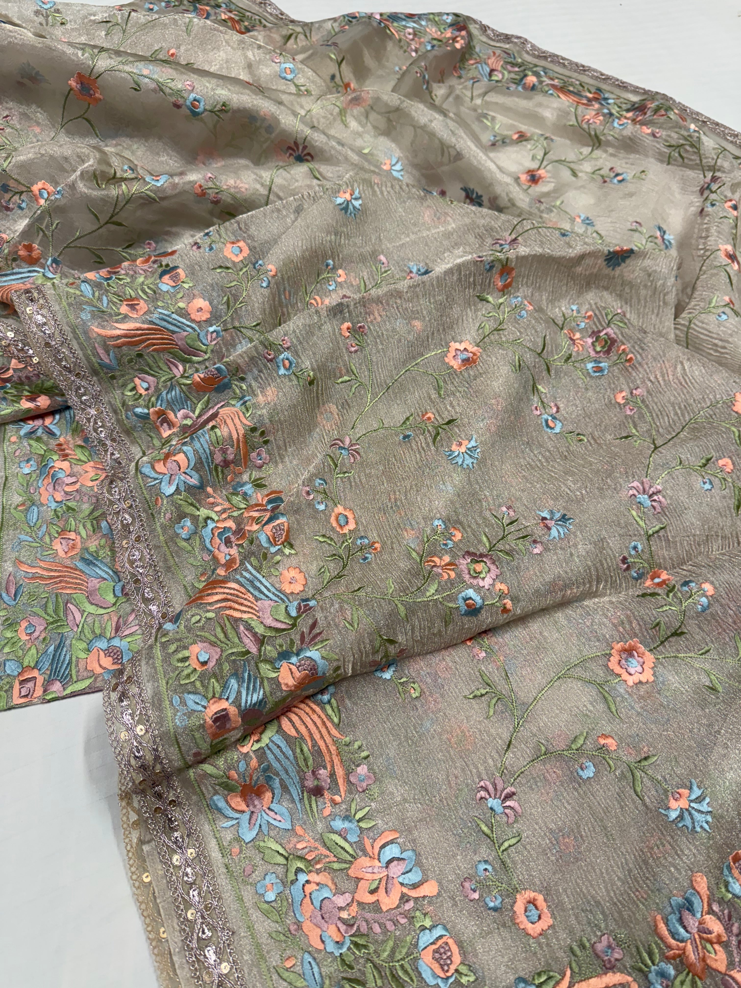 “Parsi gara” inspired tissue silk heavy resham work hand embroidered saree