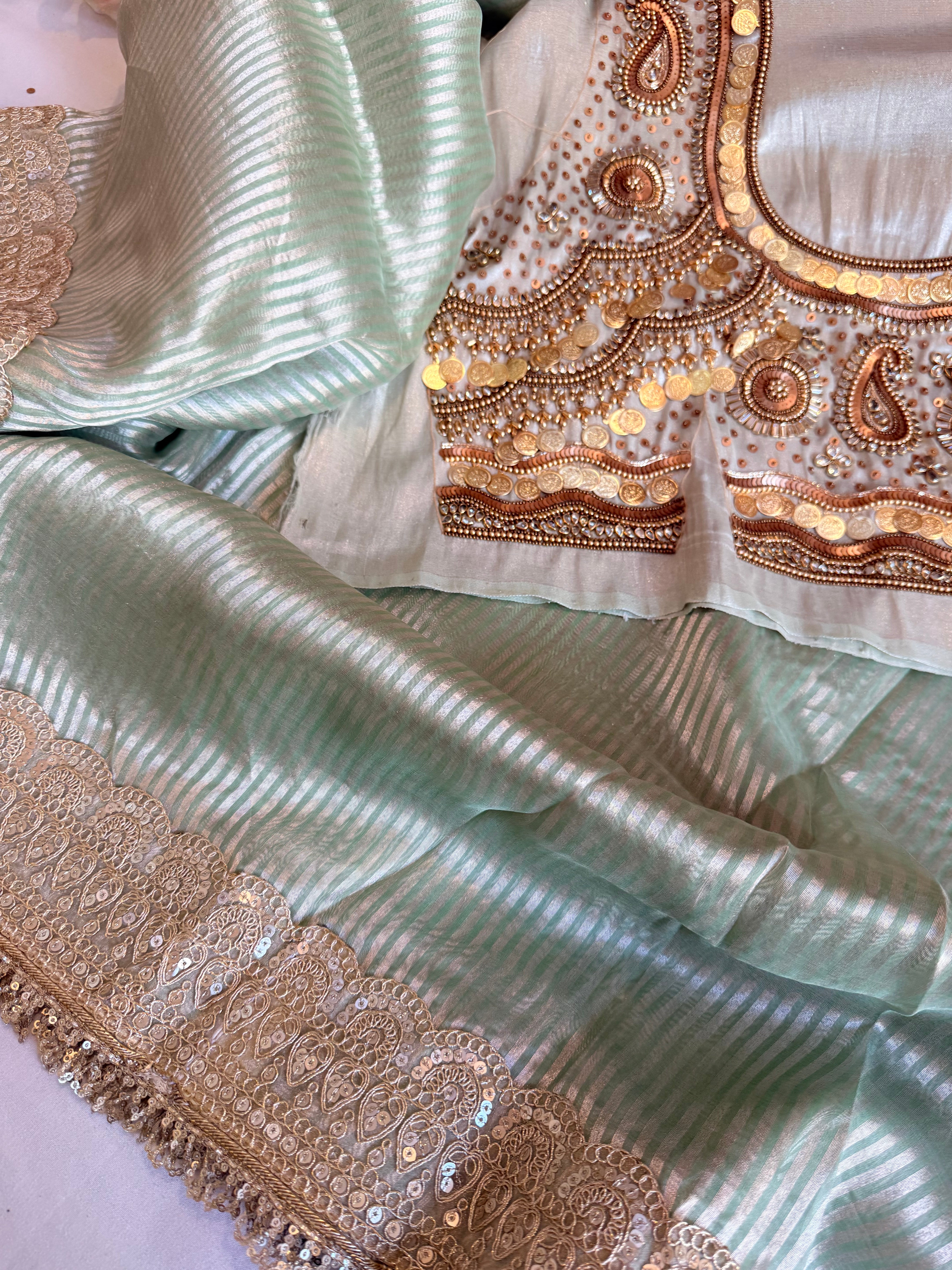 Kundan blouse edit - Sea green tissue silk hand embroidered striped saree with jewellery blouse