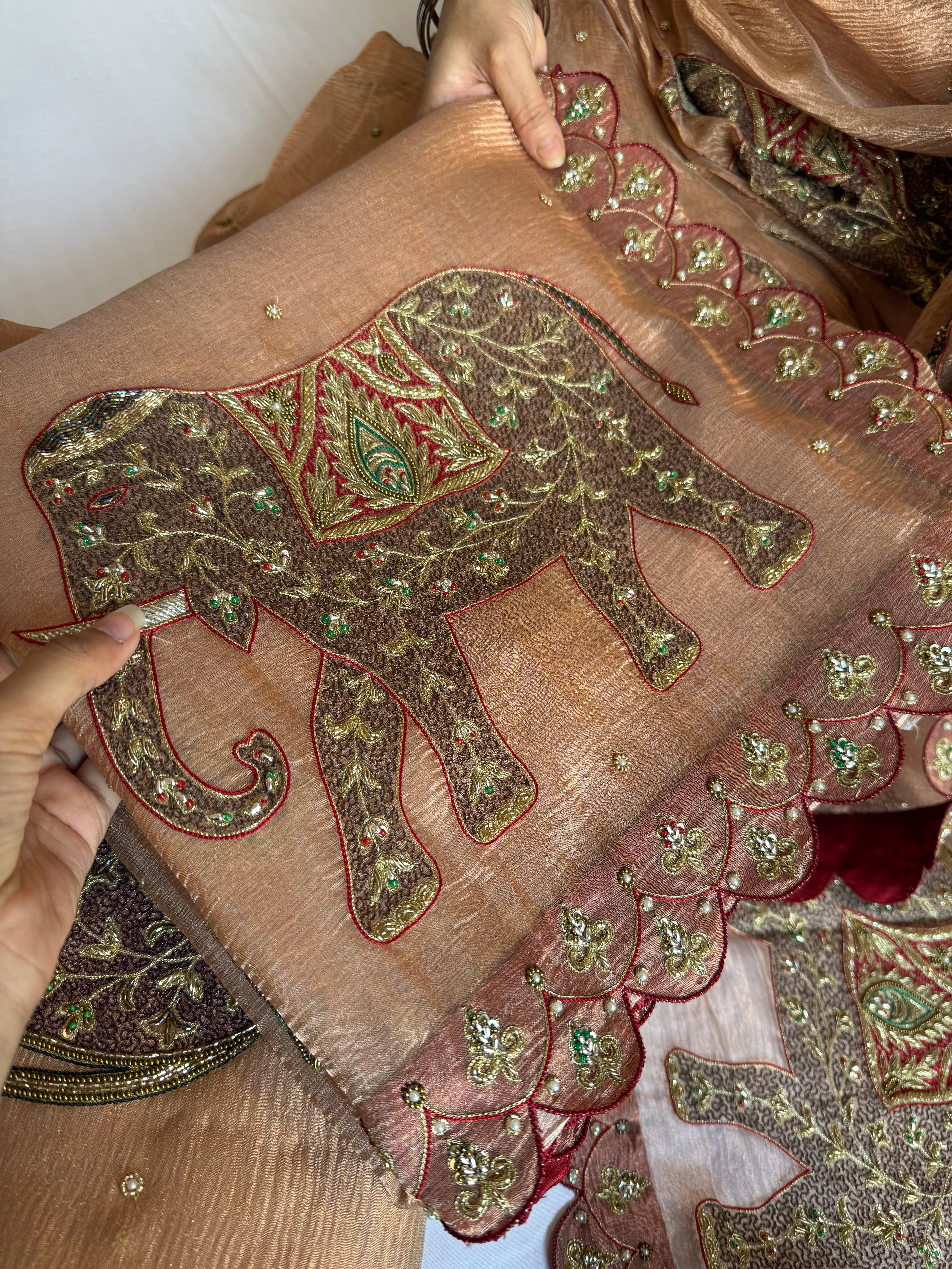 GajGamini crushed copper tissue silk elephant motif heavy hand embroidered meenakari work saree