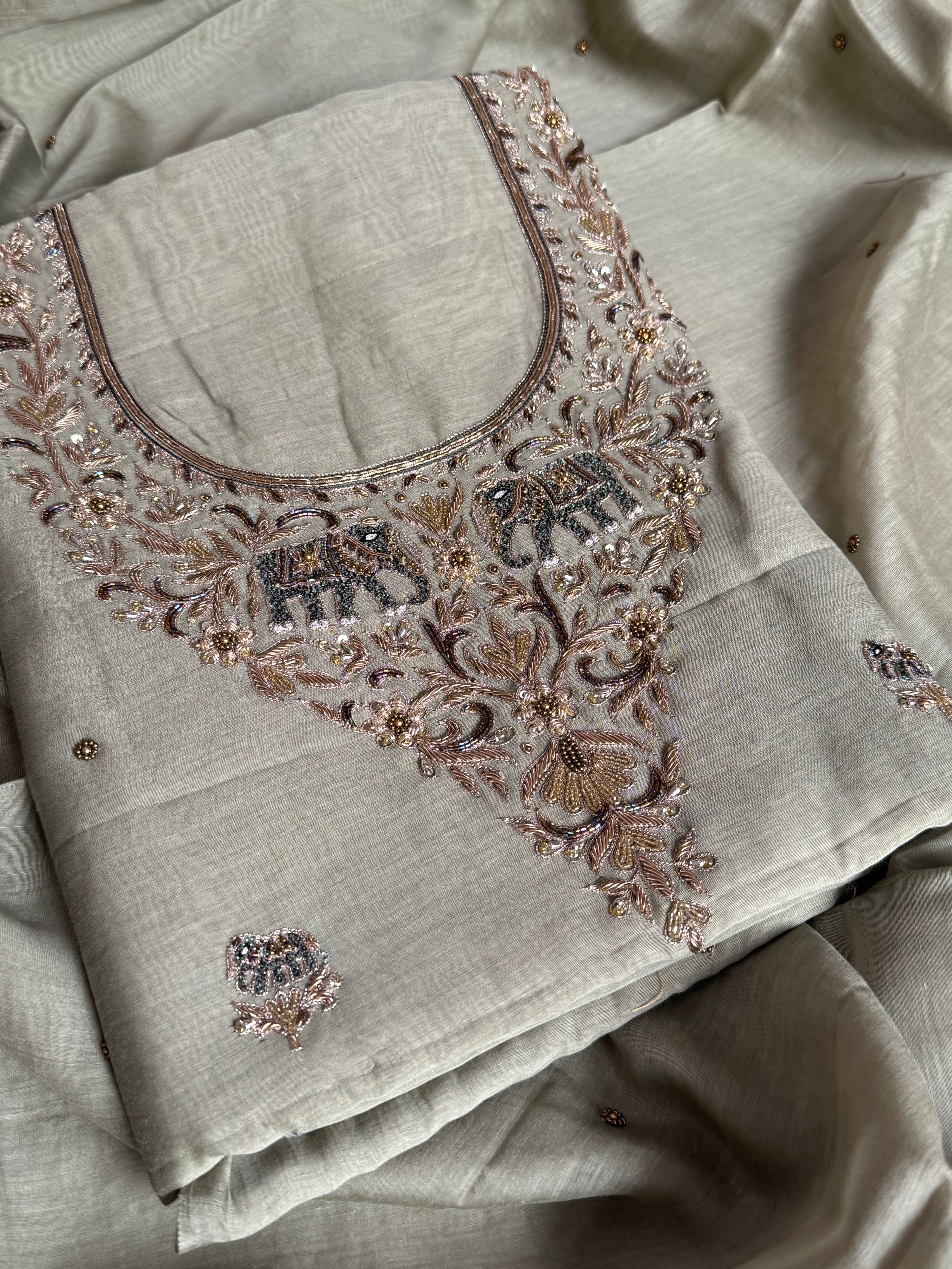 Banarasi formal wear mul cotton sage green hand embroidered kadhwa suit set with mul cotton hand embroidered duppata