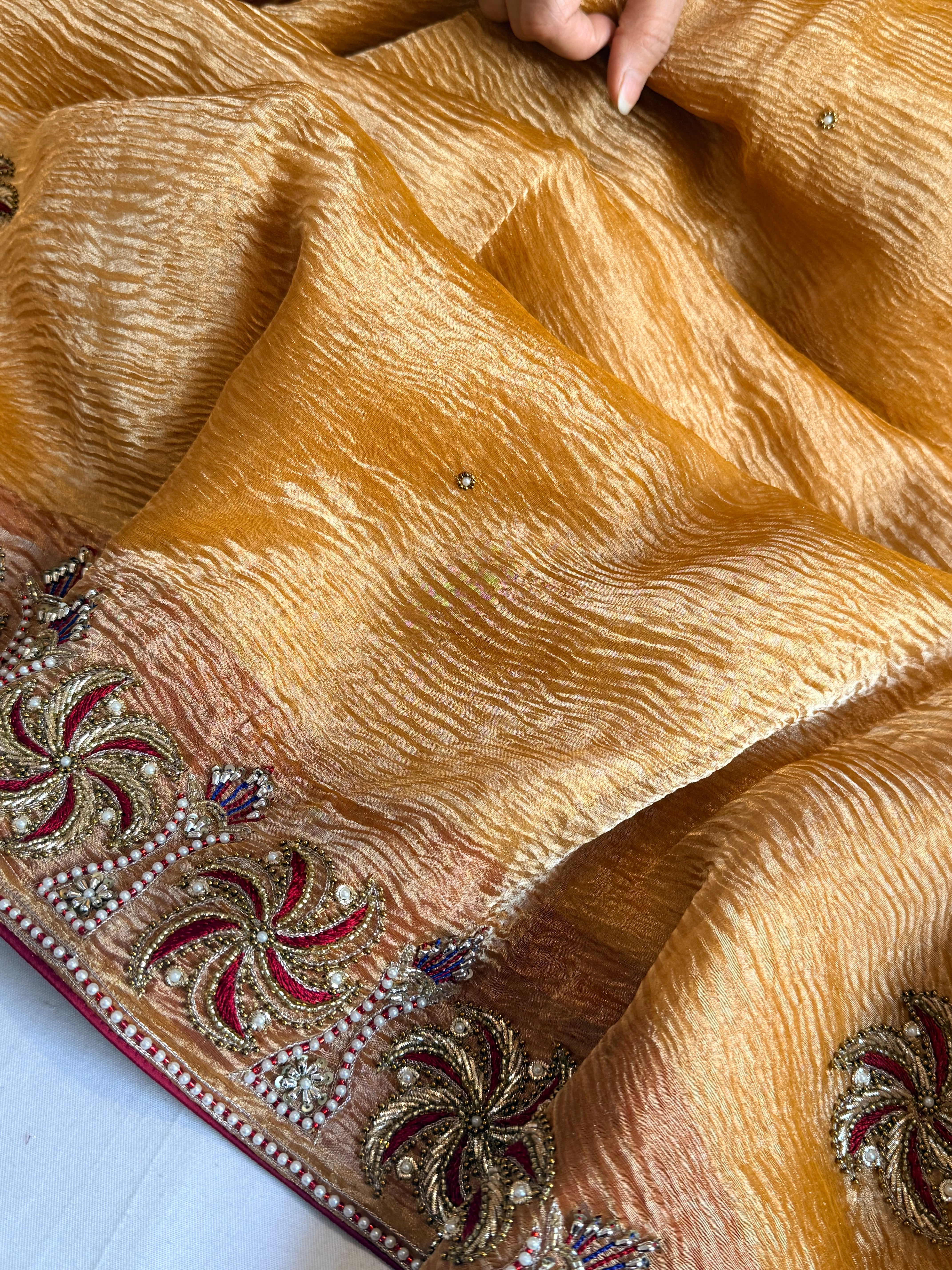 Rajkumari kesari yellow crushed tissue silk zardozi work hand embroidered saree