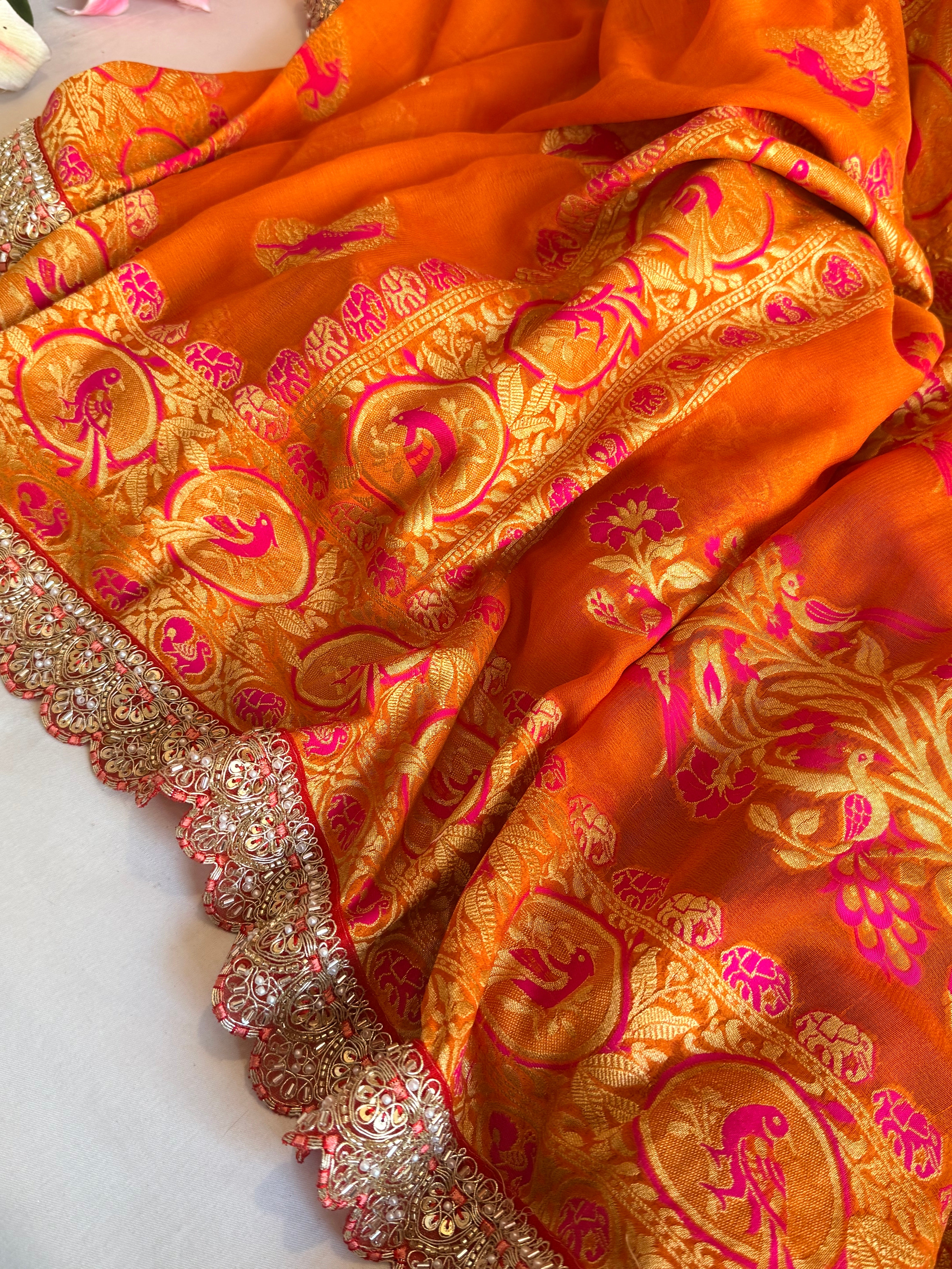 Juicy orange shikargah kadhwa border chiffon gorgette banarasi saree