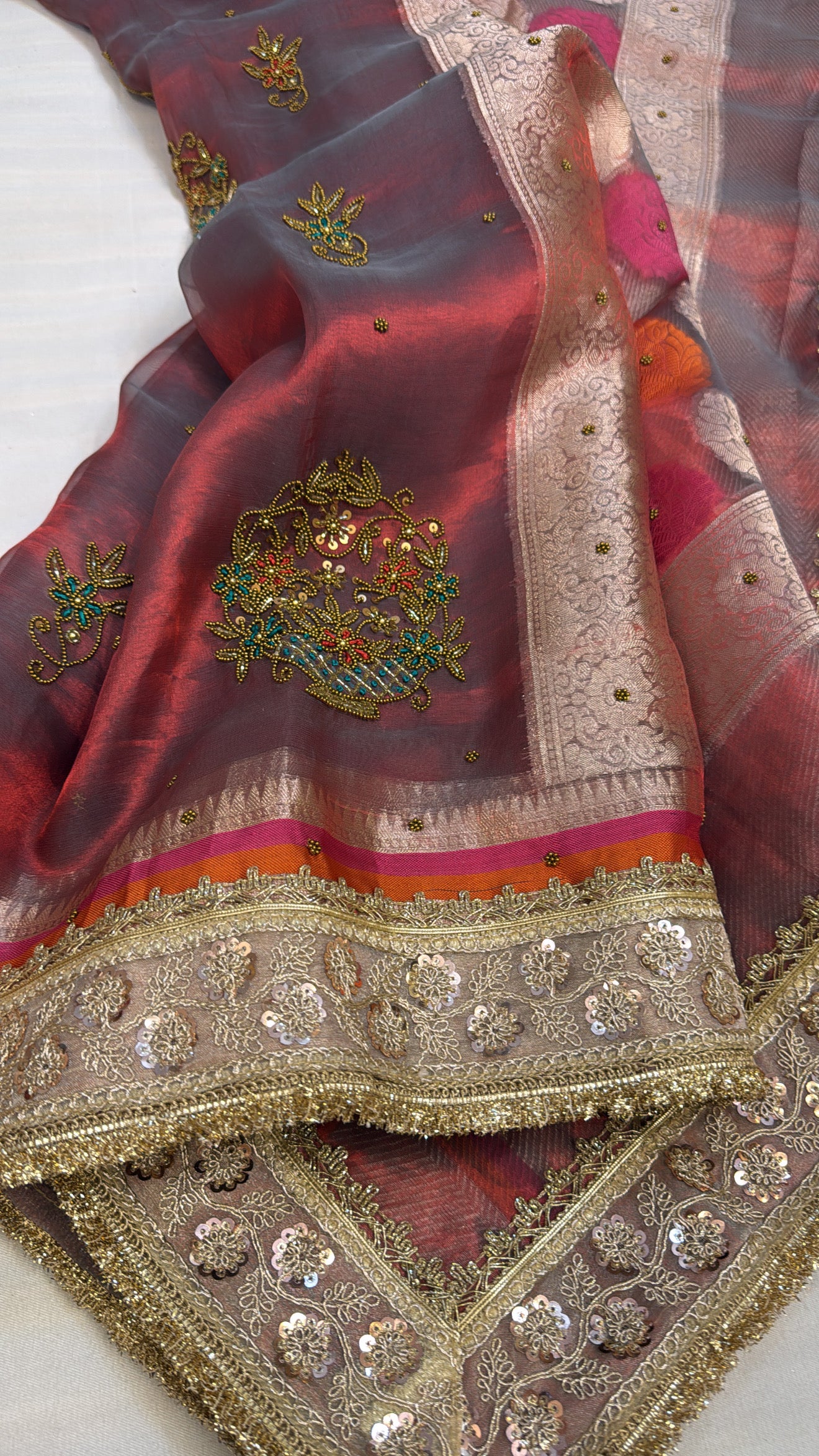 Husn dusty red antique zari hand embroidered tissue silk saree