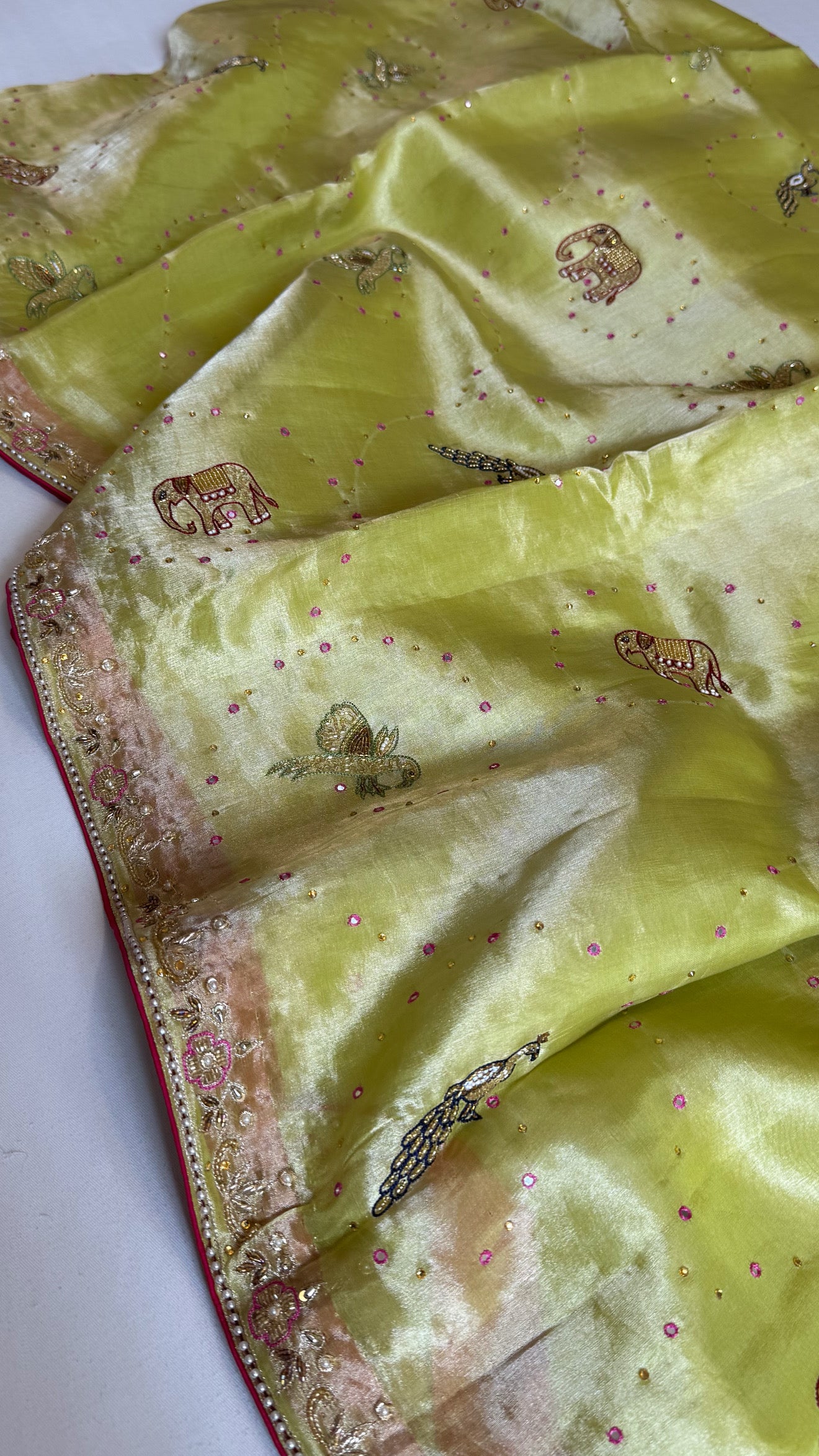 Lime yellow shikarbagh edit tissue silk kadhwa hand embroidered saree