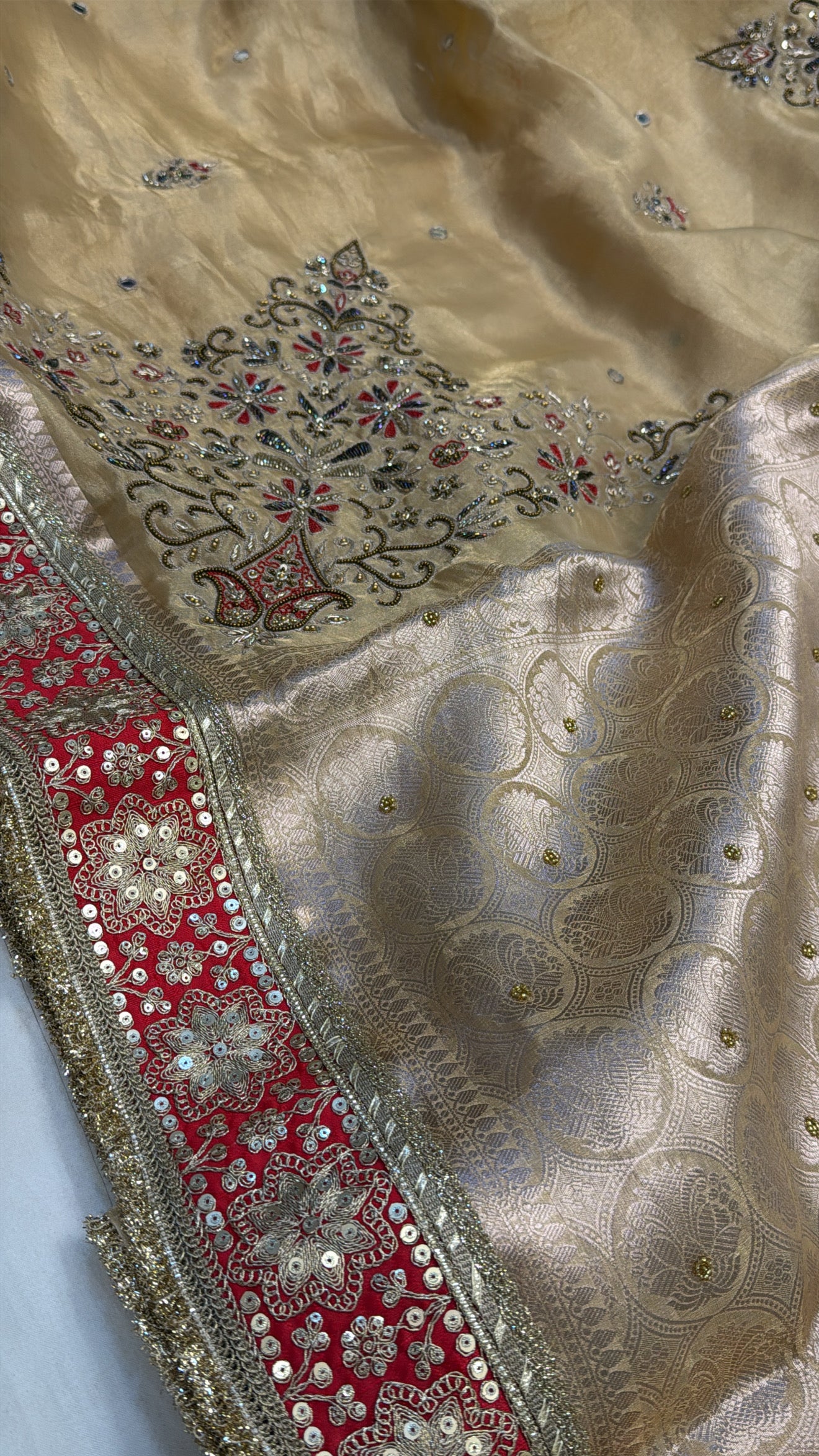 Golden with red meenakari husn tissue silk hand embroidered saree