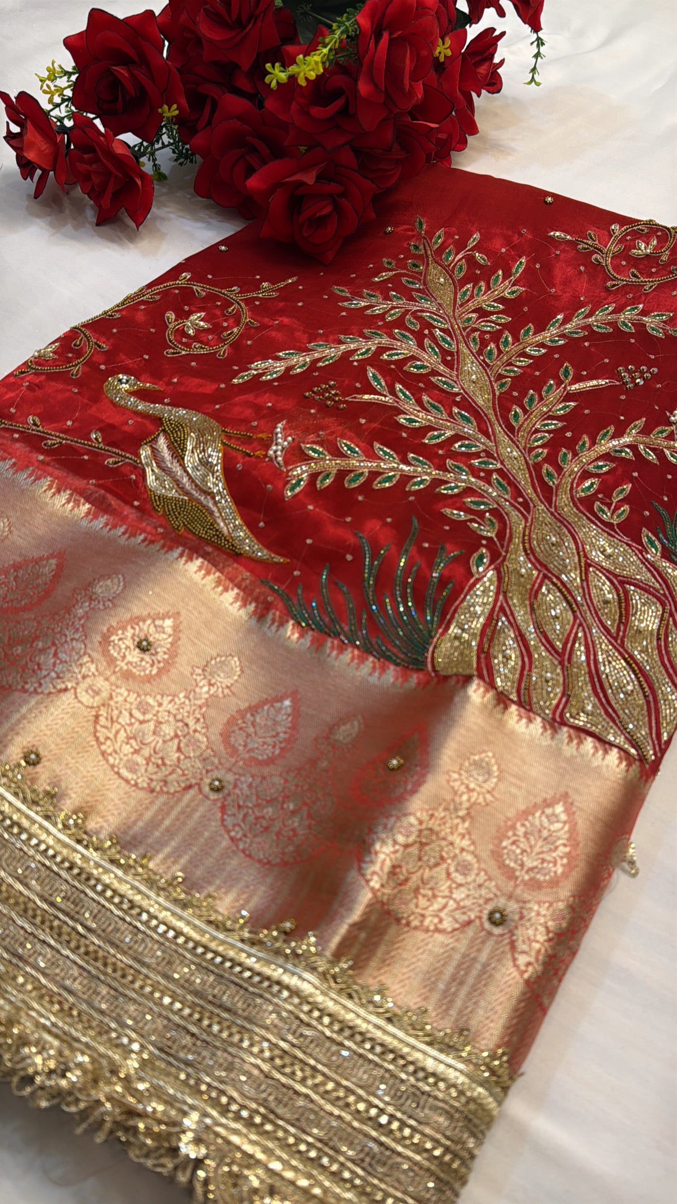 Dulhan ka joda husn red tissue silk hand embroidered saree