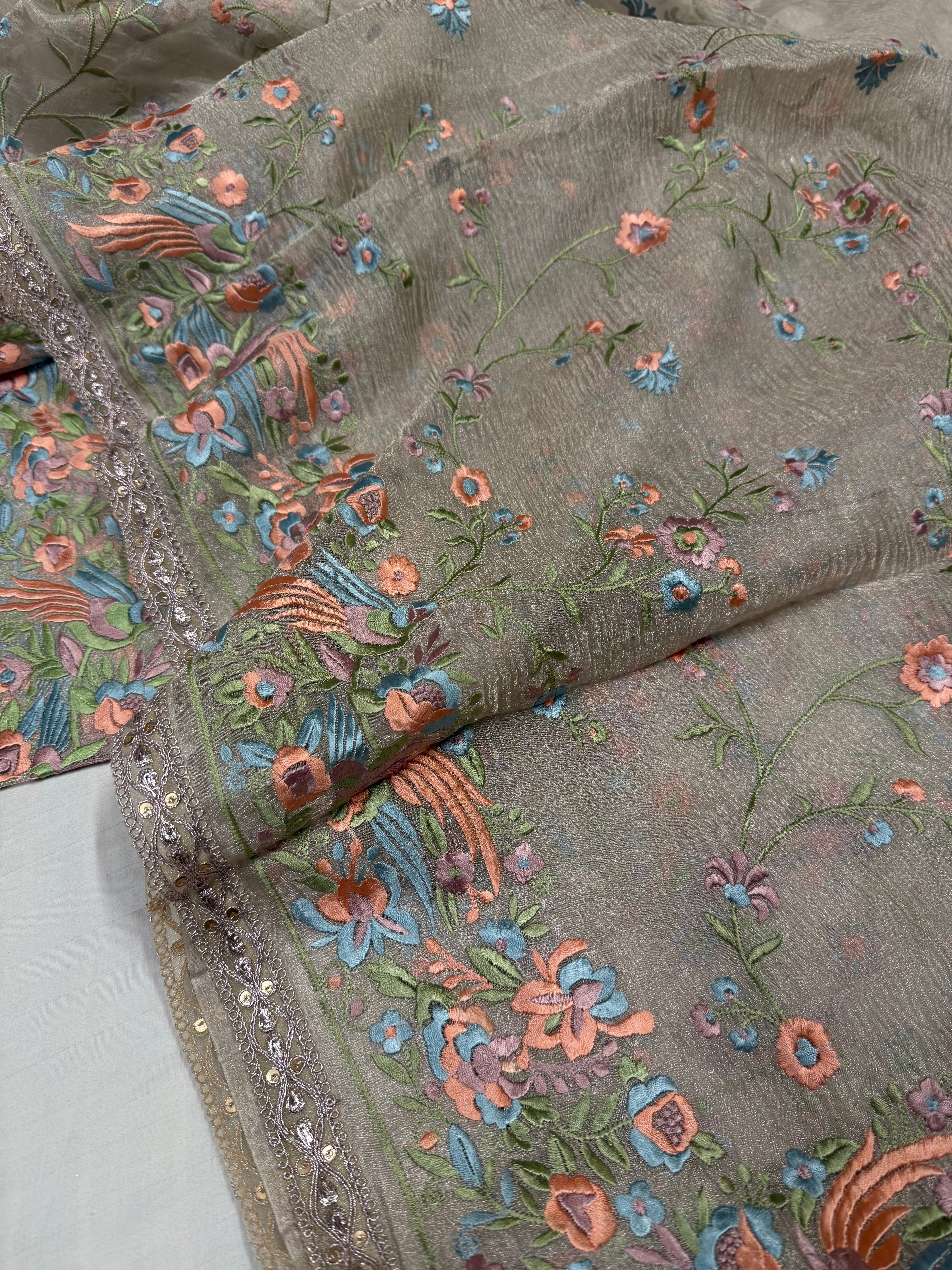 “Parsi gara” inspired tissue silk heavy resham work hand embroidered saree