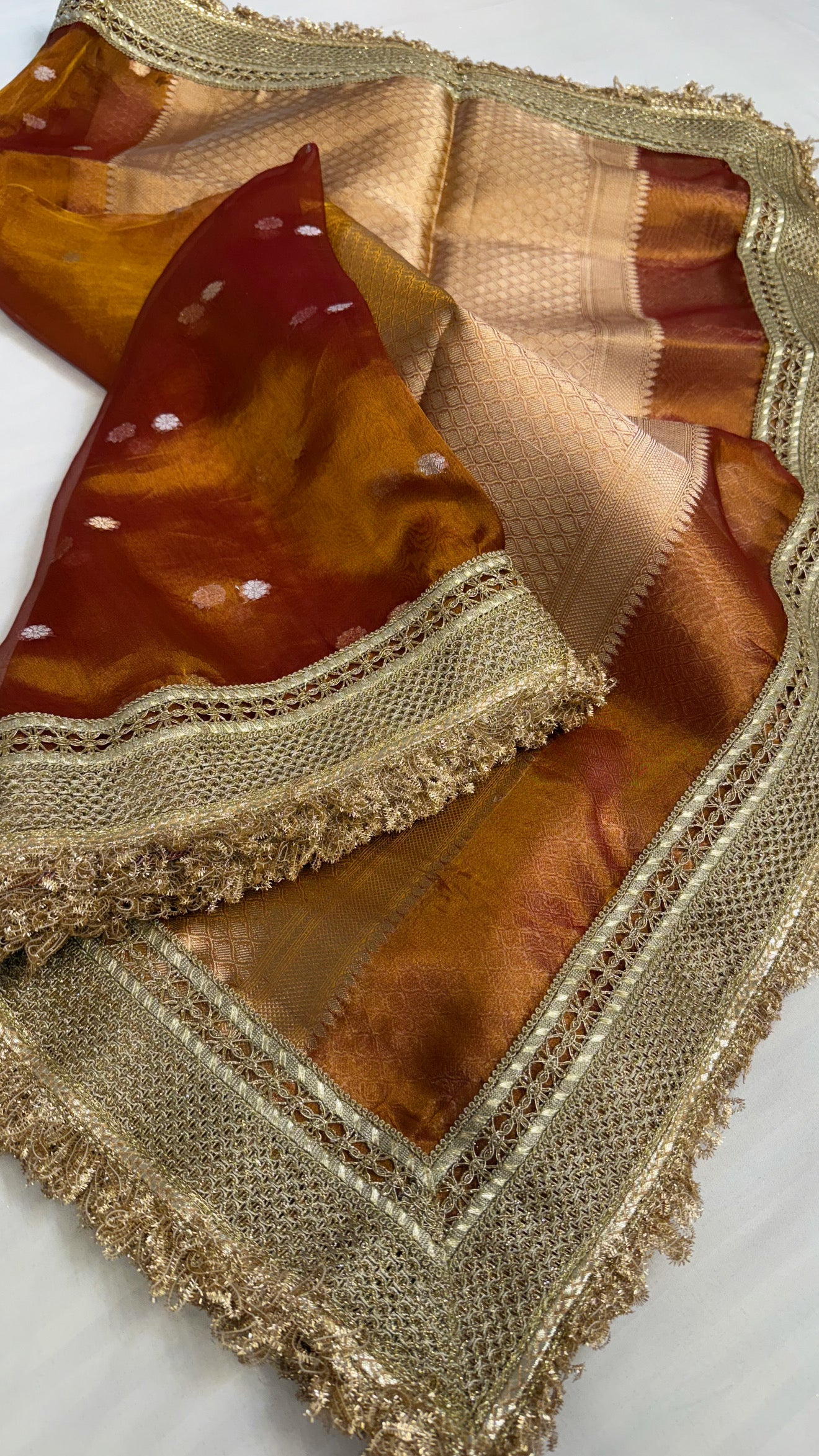 Maharani burnt orange tissue silk kadhwa buti saree