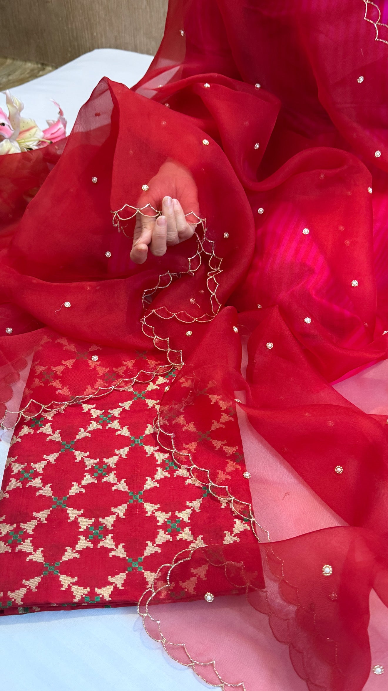 Blood red katan silk patola weaving kurta paired with kora silk scalloped duppata set