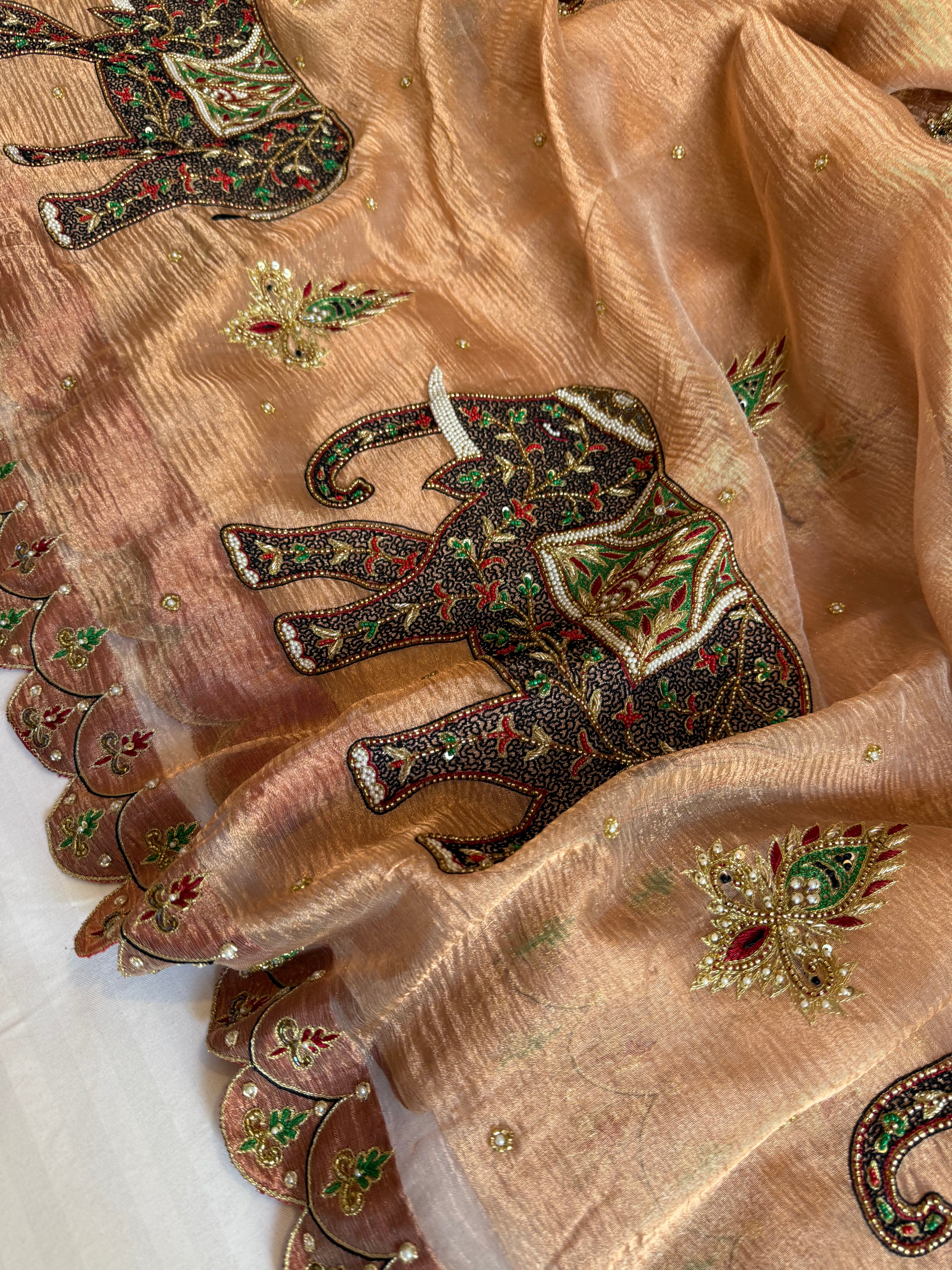 GajGamini copper crushed tissue silk elephant motif heavy hand embroidered saree