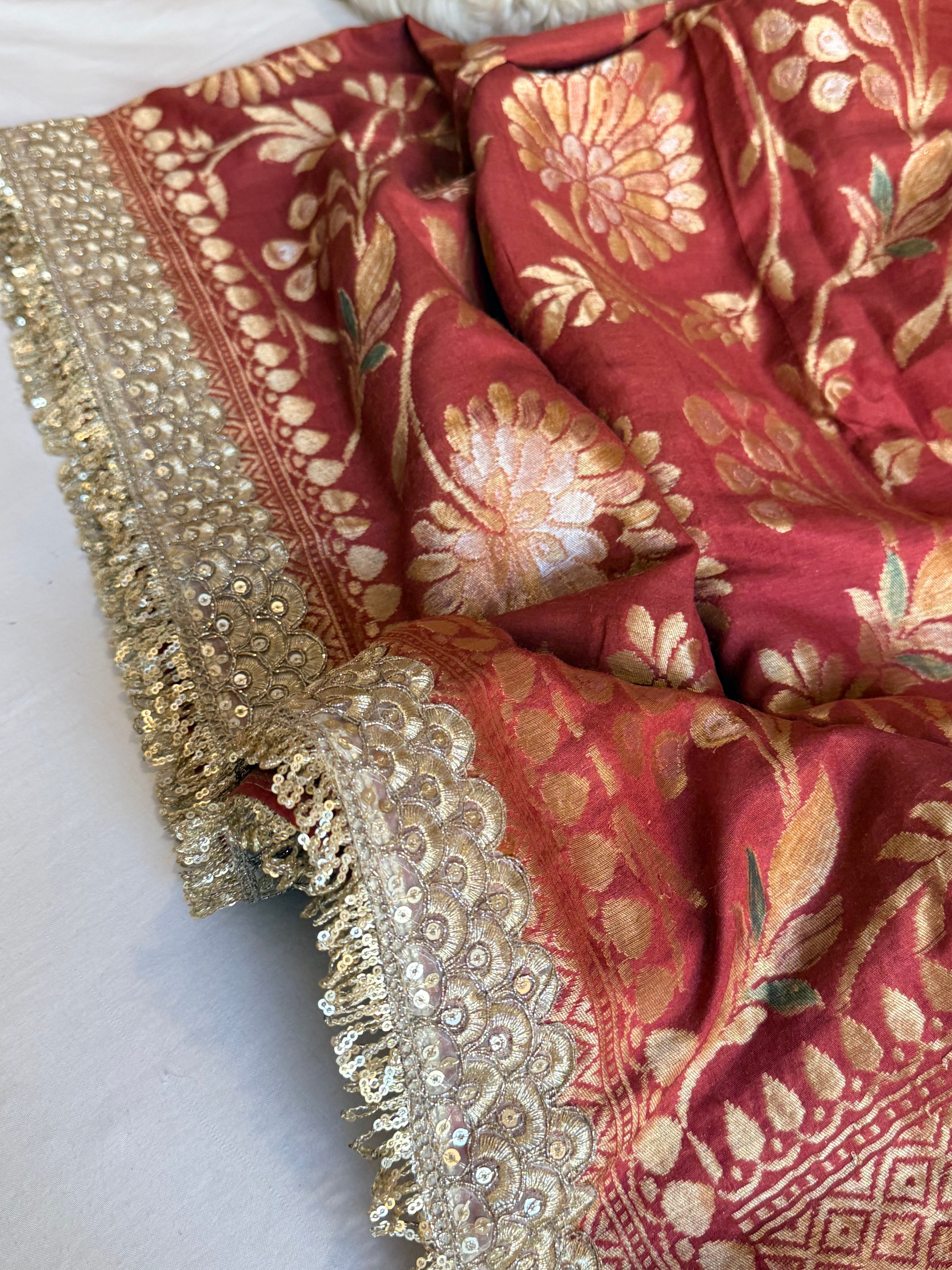 Maroonish red moonga silk meenakari jungla kadhwa saree