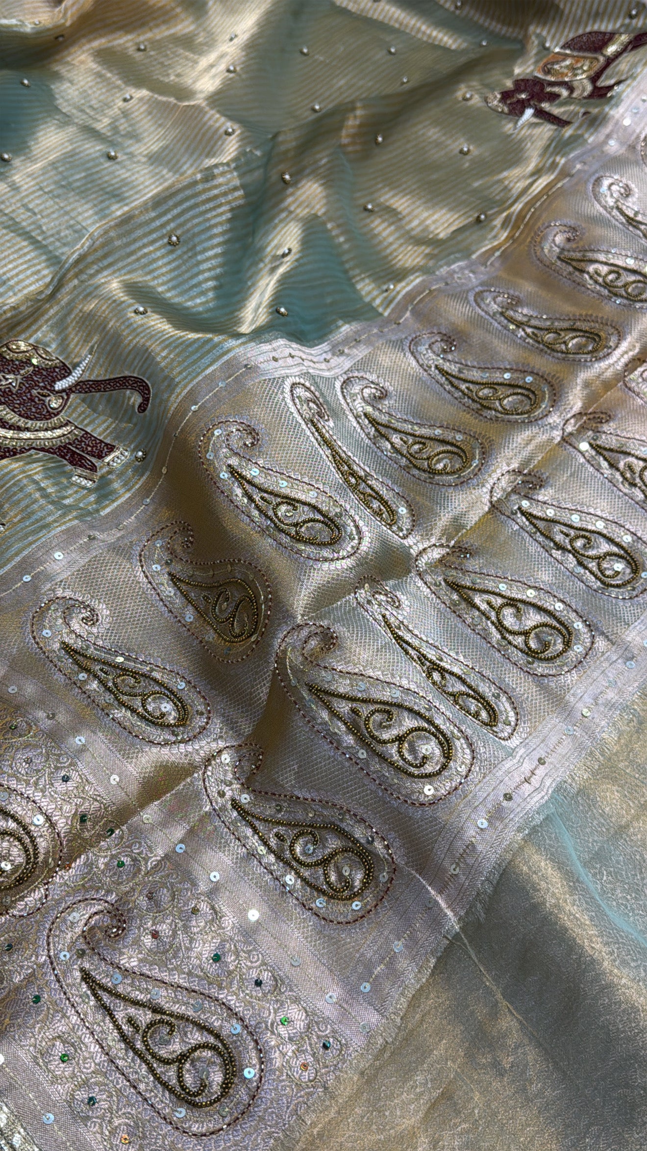 Molten gold-sage green tissue silk ombre shaded hand embroidered saree