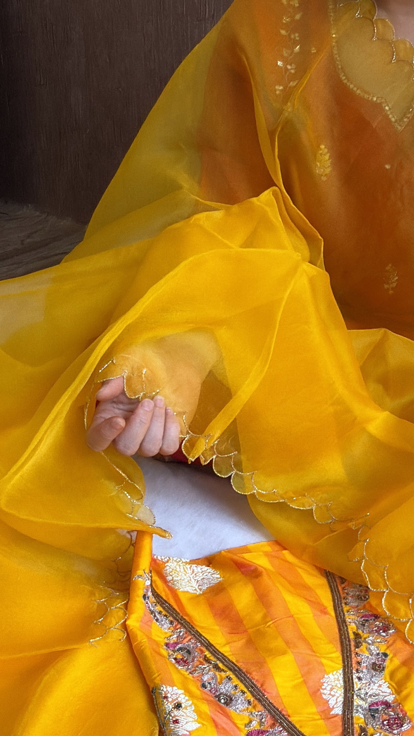 Haldi yellow-orange dhup chao effect katan silk striped kurta paired with kora silk scalloped duppata set