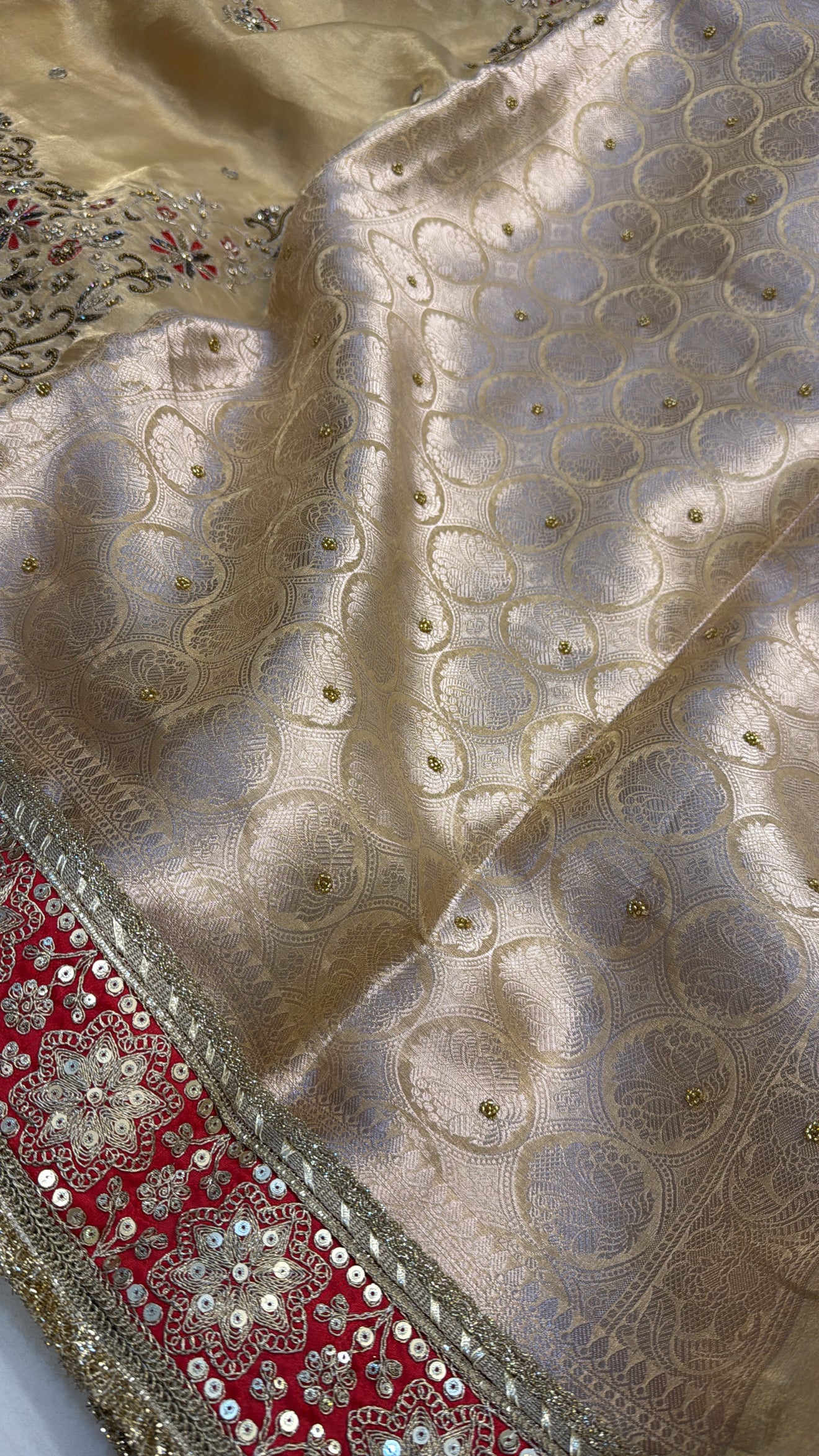 Golden with red meenakari husn tissue silk hand embroidered saree