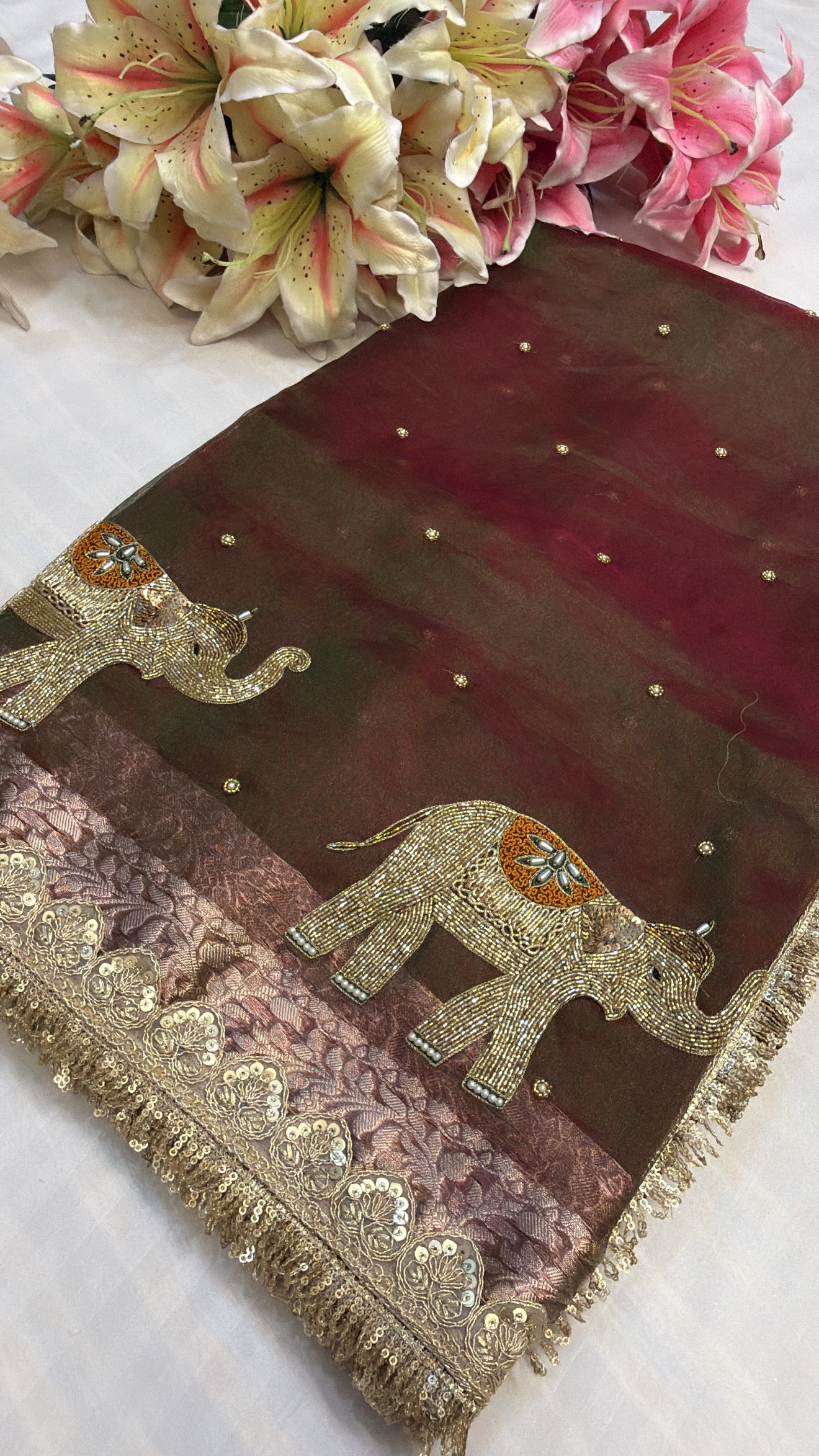 Mehendi green dhup chao effect tissue silk hand embroidered elephant motif saree