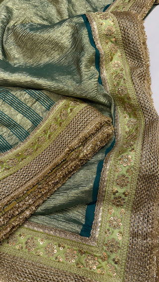 Moonga crushed tissue silk bottle green saree