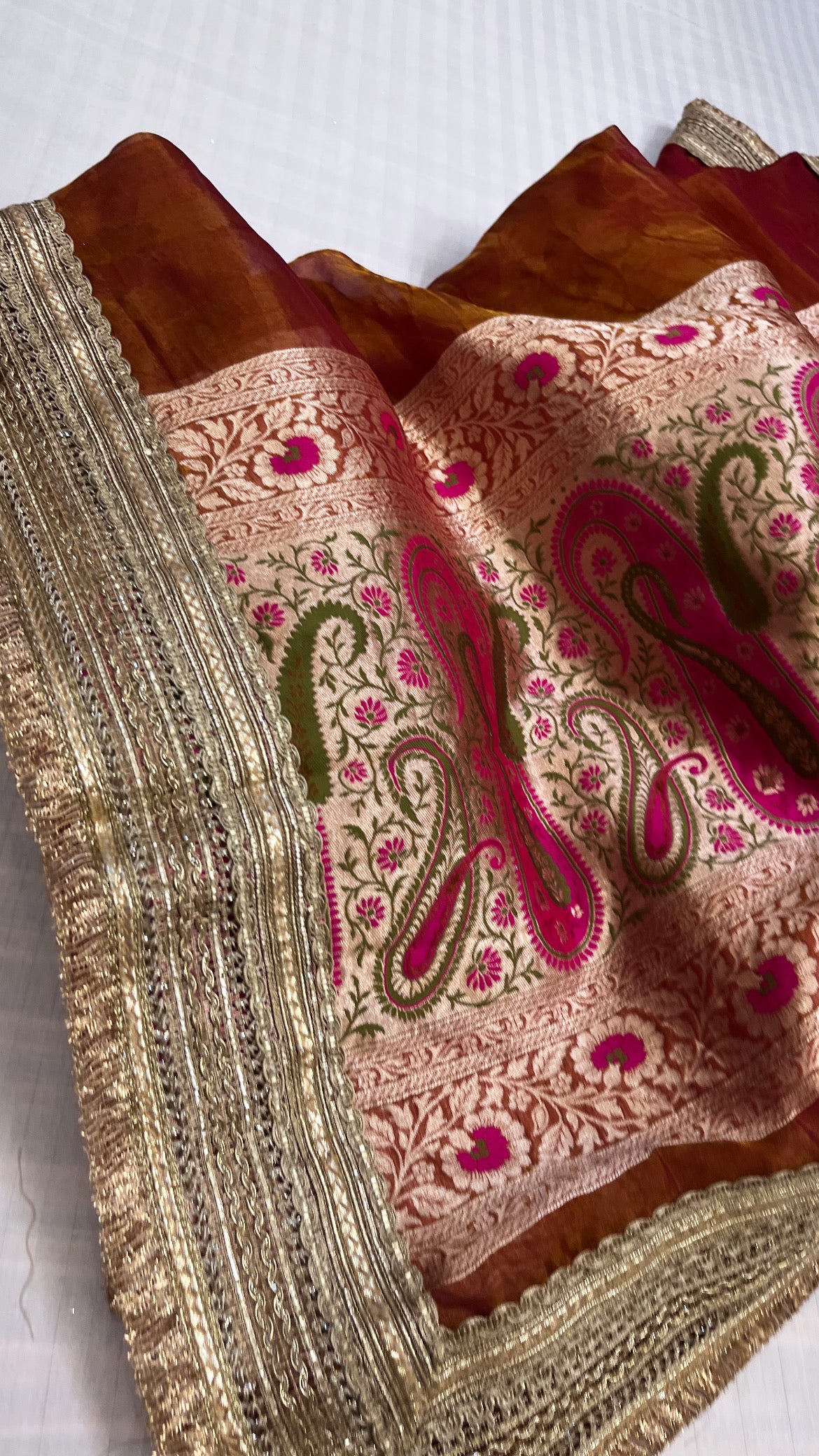 Maharani reddish-orange tissue tanchoi jamevar meenakari saree