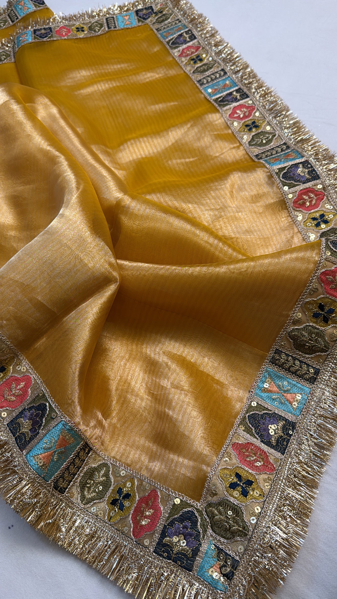 Haldi yellow tissue silk kadhwa meenakari border saree