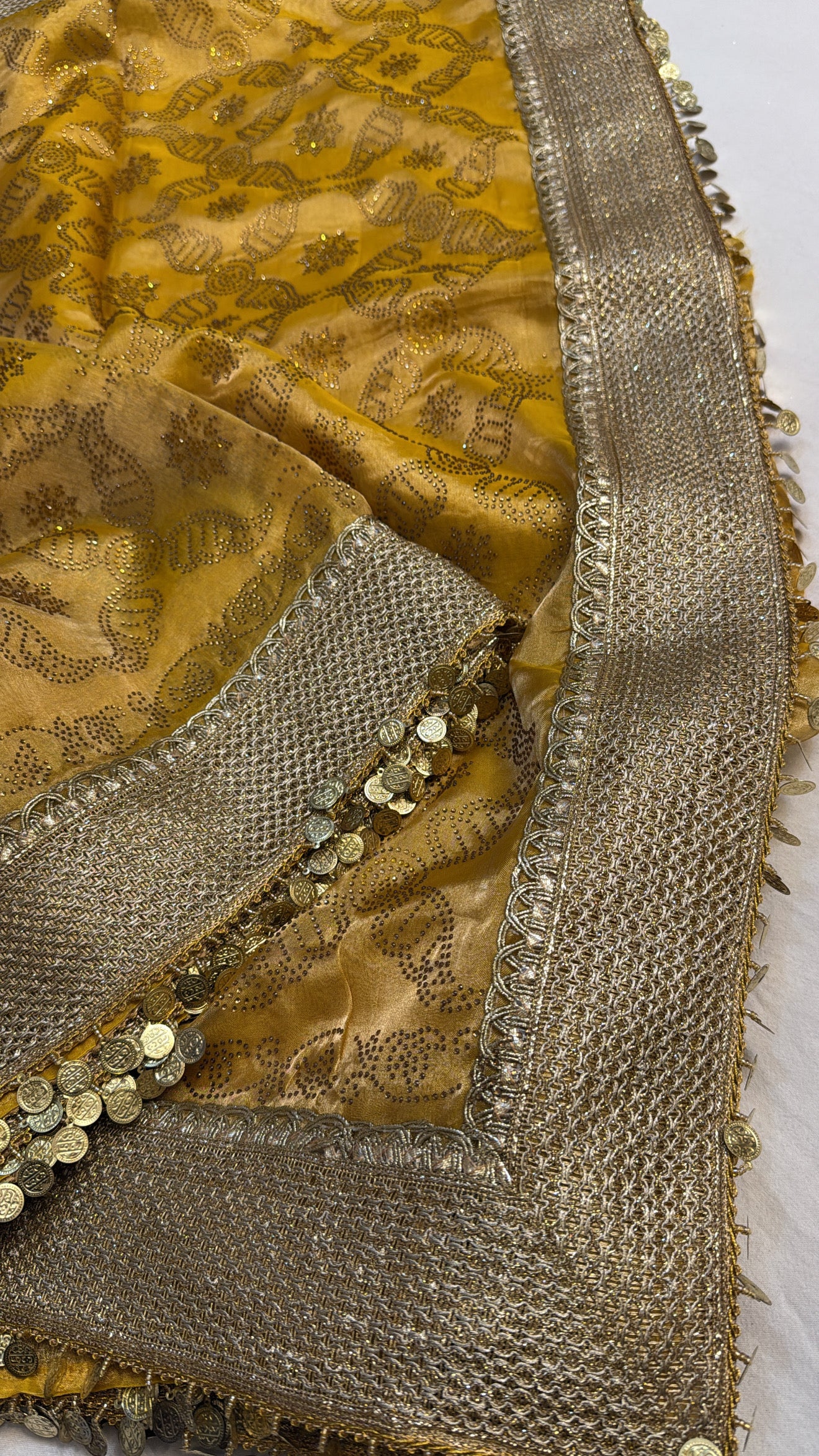 Maharani sitara stonework haldi yellow tissue silk kadhwa saree