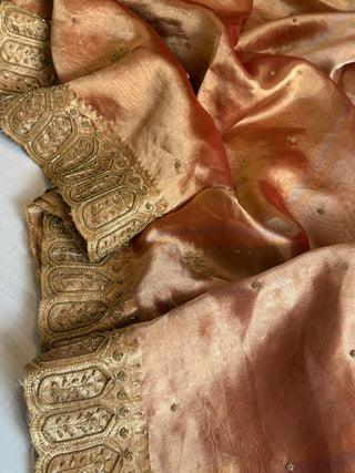 Husn reddish orange tissue silk heavy hand embroidered saree
