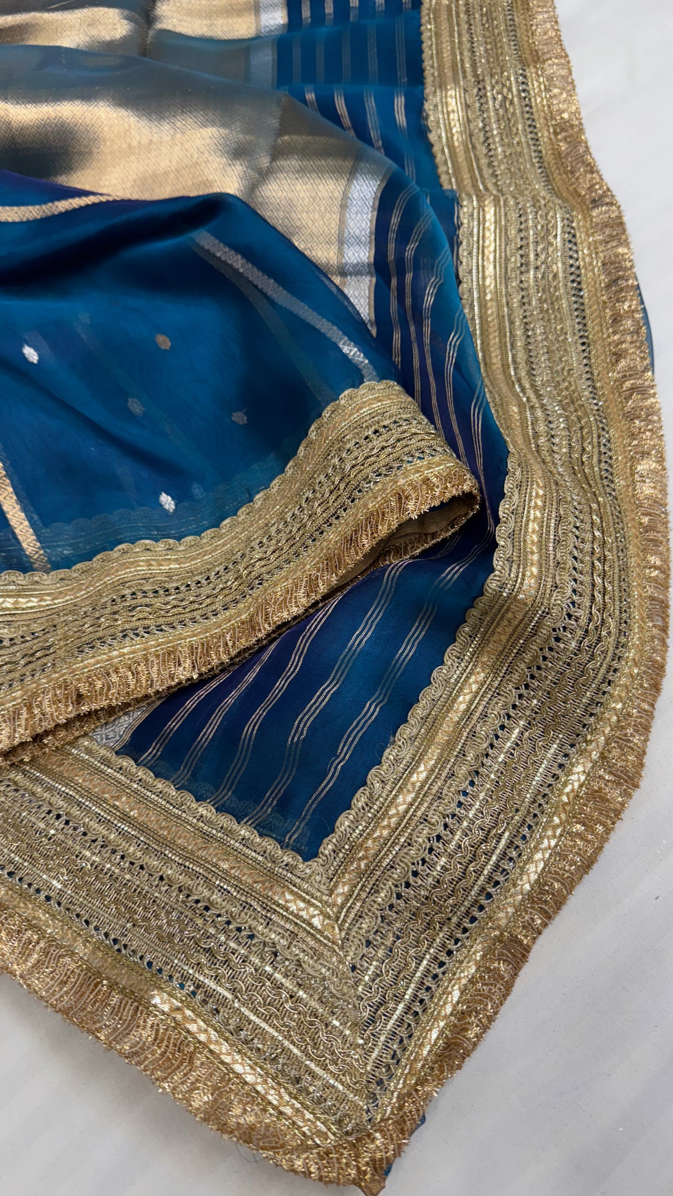 Maharani aqua blue tissue silk kadhwa buti saree
