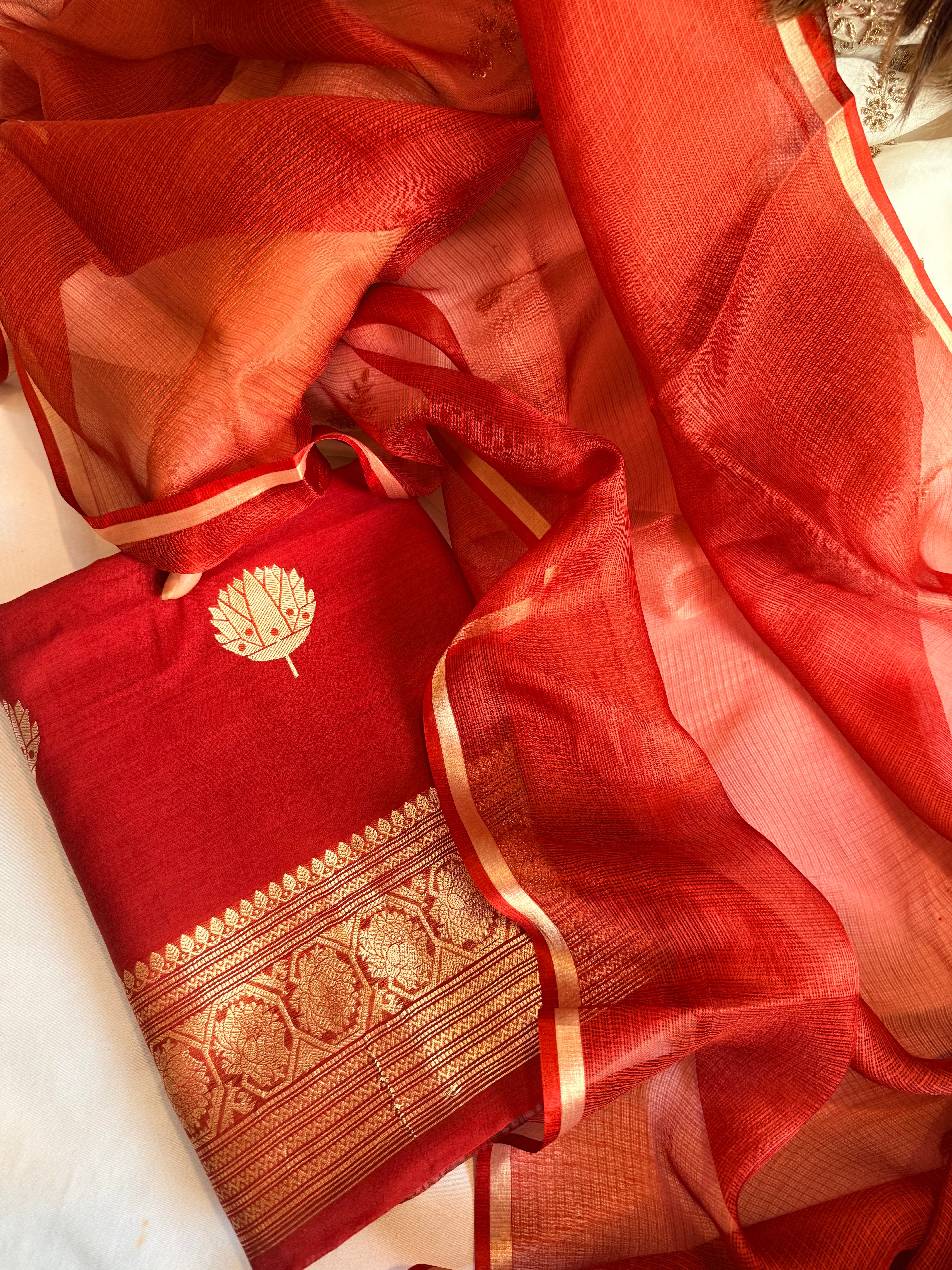 Blood red mul cotton kadhwa buti kurta paired with kora silk net duppata set