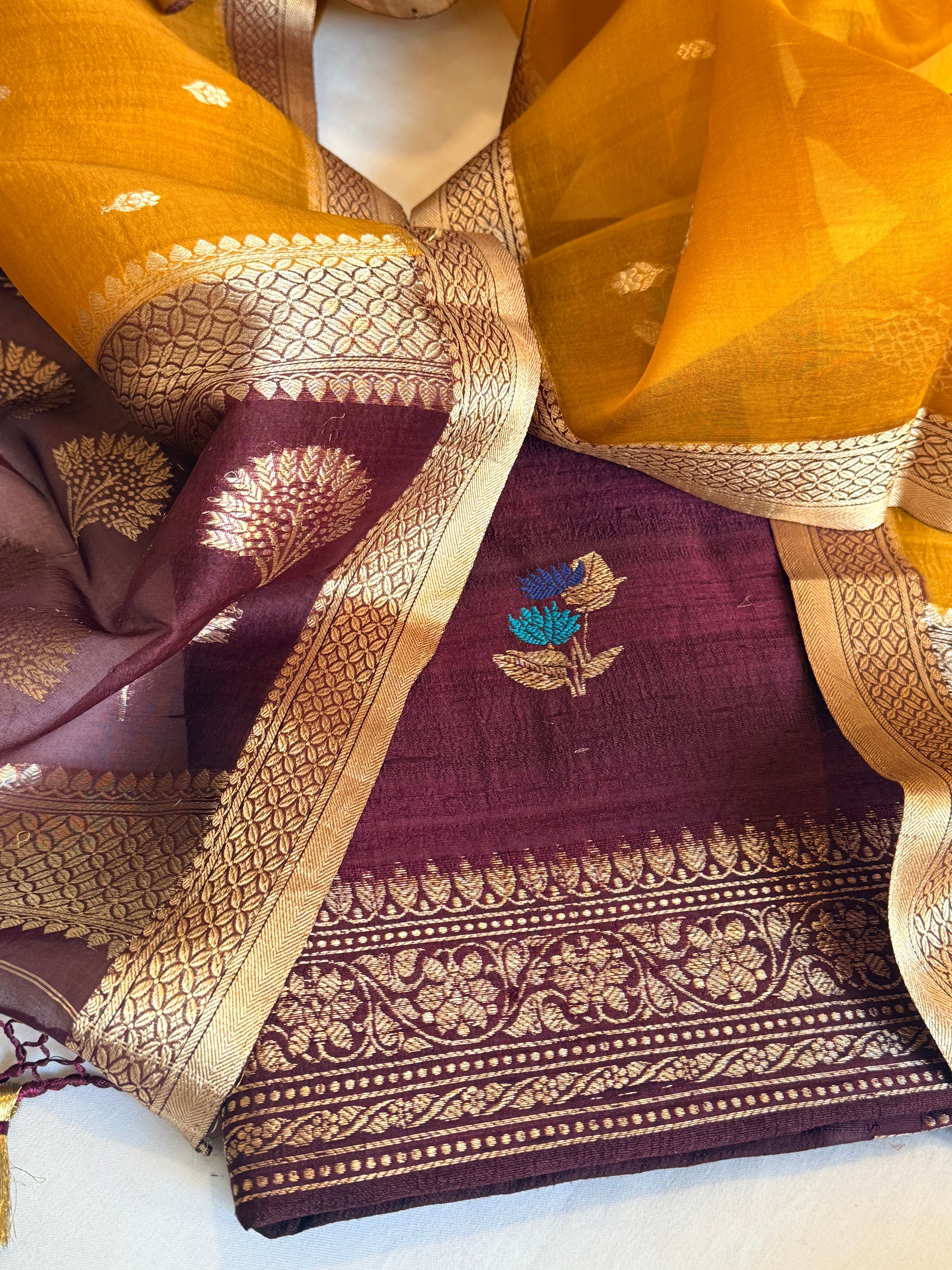 Deep plum-mustard yellow raw silk kadhwa kurta paired with kora silk chap dye duppata