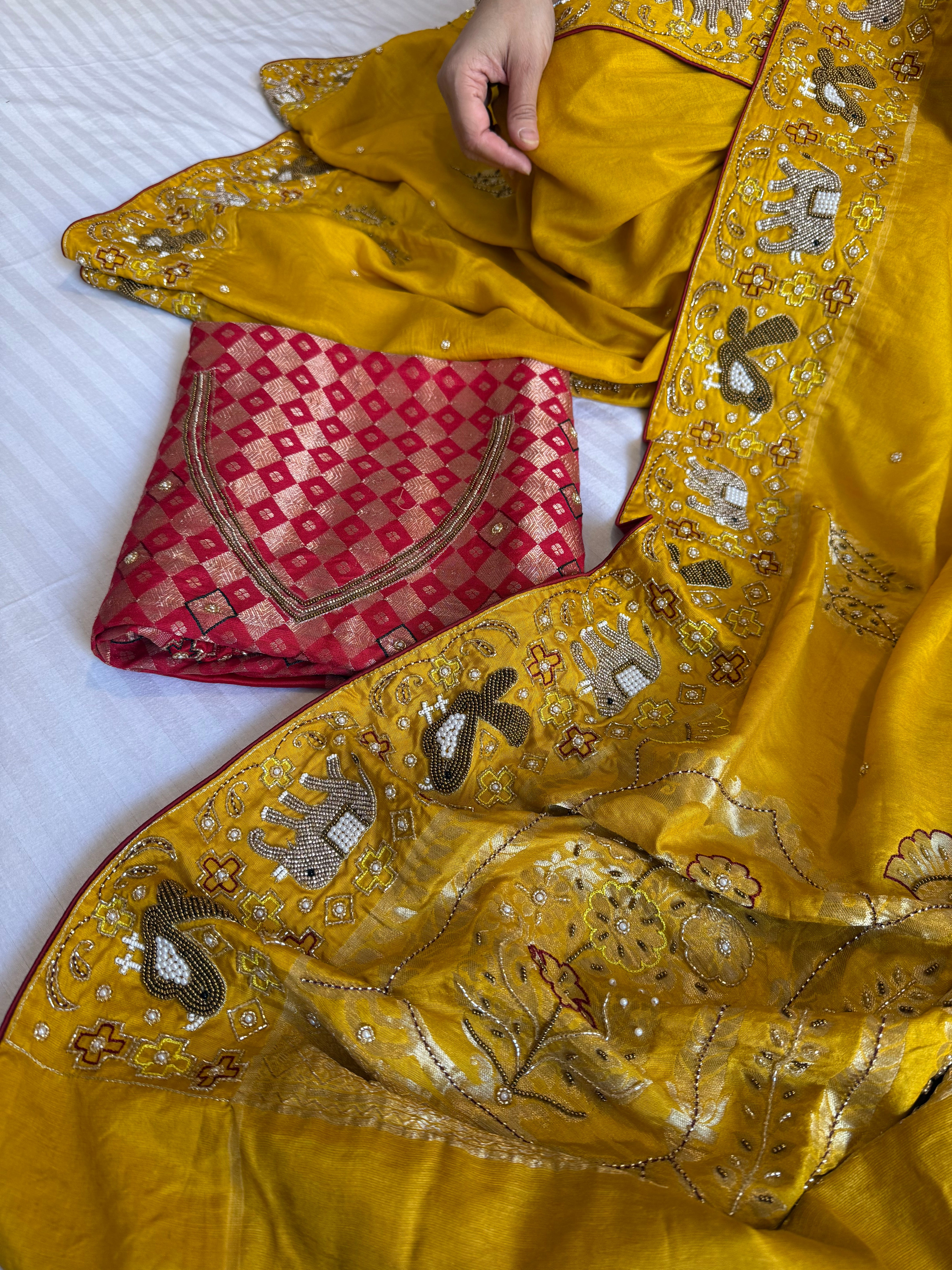 Moonga silk ikkat patola inspired hand embroidered kadhwa saree