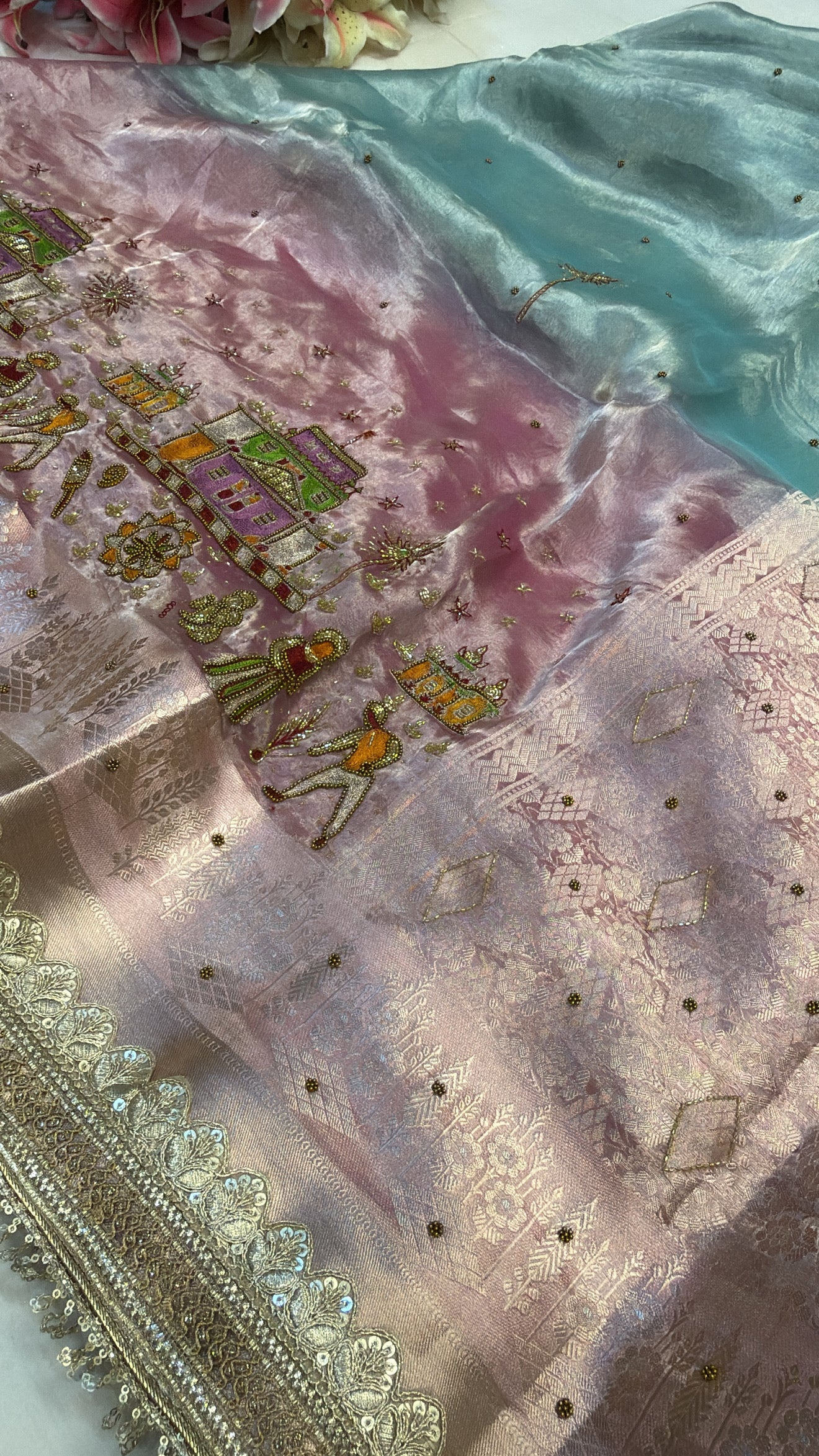 Blush pink-blue ombre shaded tissue silk hand embroidered saree