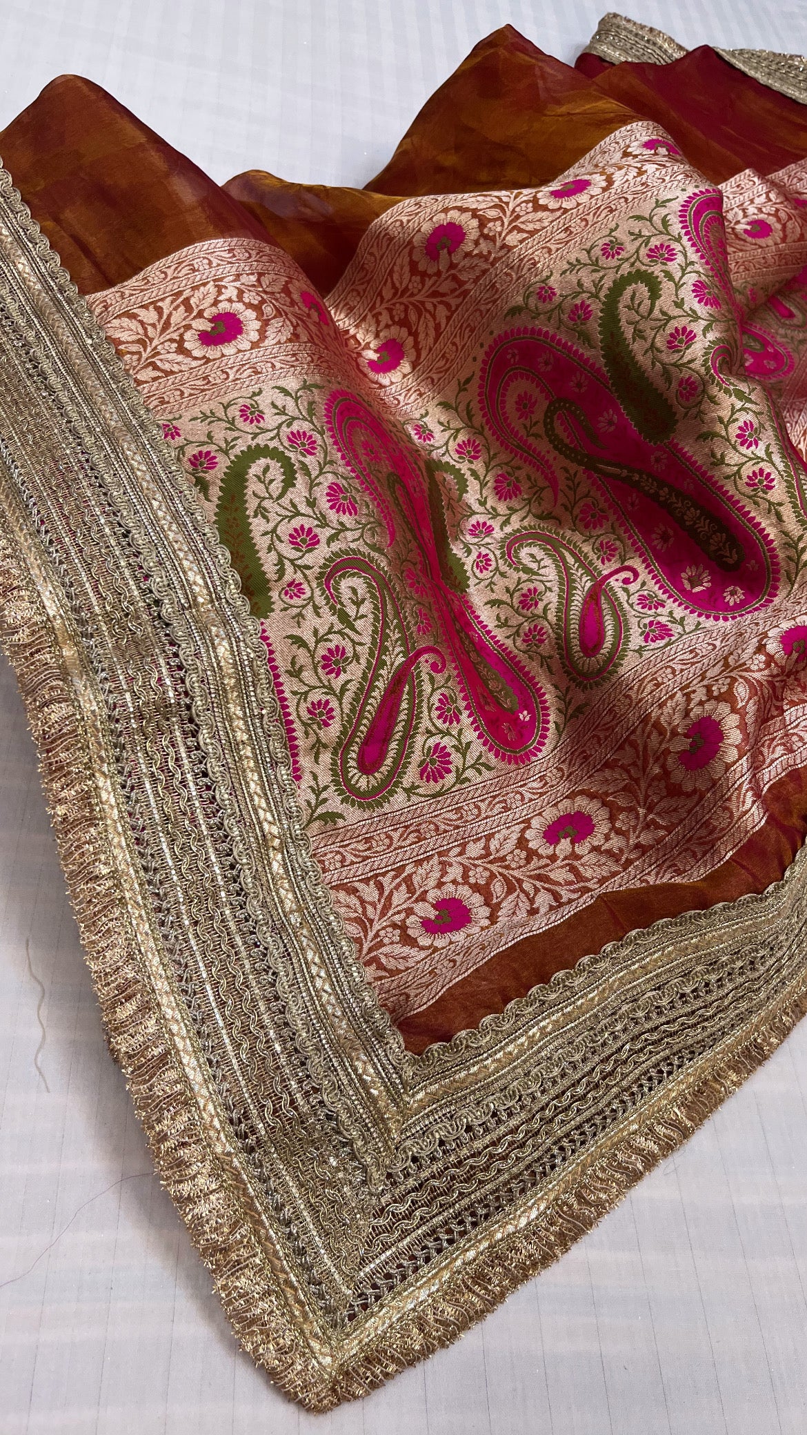 Maharani reddish-orange tissue tanchoi jamevar meenakari saree