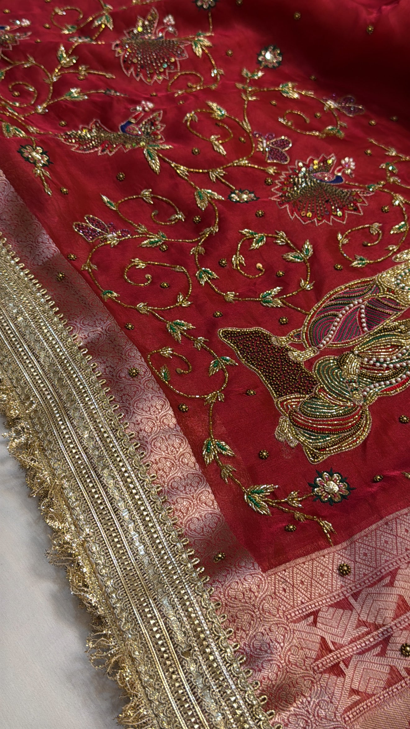 Dulhan ka joda husn red tissue silk hand embroidered kadhwa saree